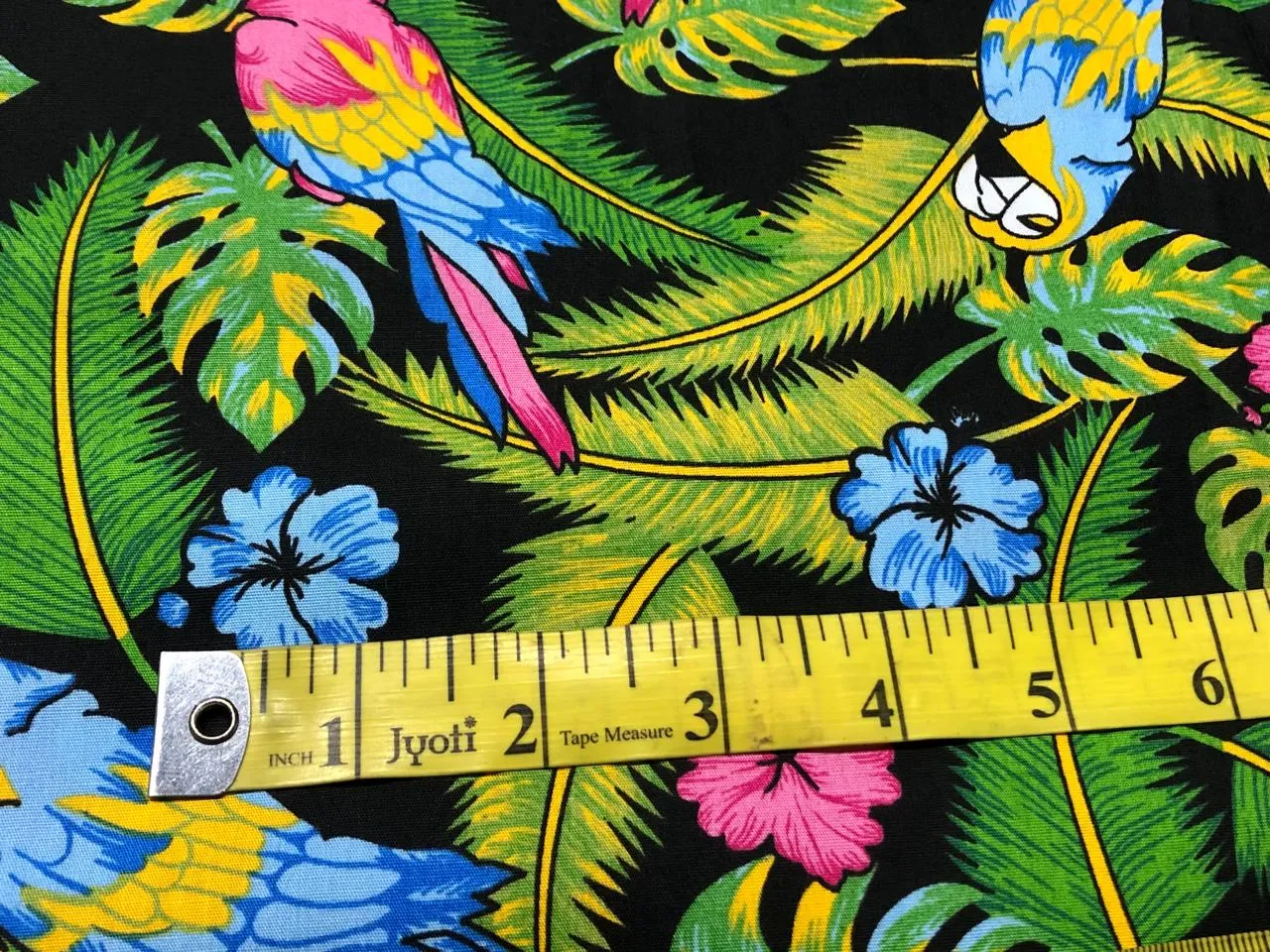 100% Cotton Poplin PRINT   58" wide RETRO BEACH available in 4 different prints pink ,orange, blue ,yellow ,green waves / black jungle with pink and blue parrots and flowers / blue with lavender pink flowers and black and white floral